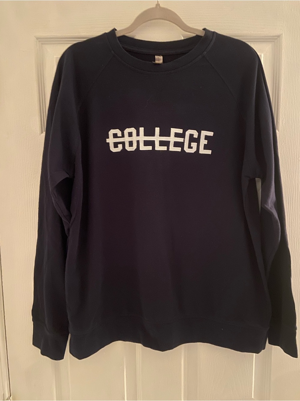 Next Level Apparel Navy Sweatshirt with White "COLLEGE" Text